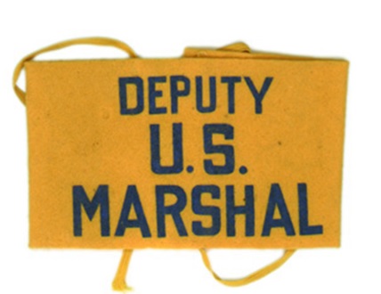 Arm band worn by DUSMs during the Civil Rights Era. 