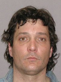 Face photo of male fugitive Jack Lee Kent
