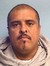 Face photo of male fugitive Ernest Madrid
