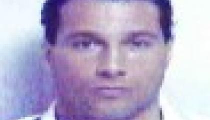 Face photo of male fugitive James Craig Tabor