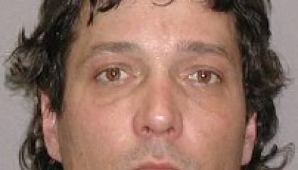 Face photo of male fugitive Jack Lee Kent