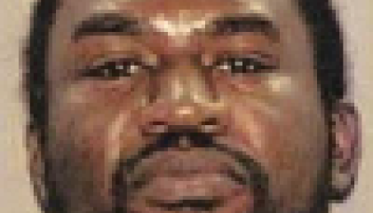 Face photo of male fugitive Cross Samuel