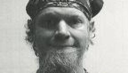 Male fugitive Jay Gardner Jordan with a scarf on head