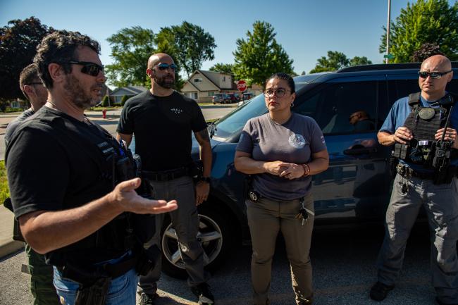 Deputy U.S. Marshals and Task Force Officers discussing…