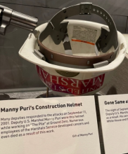 Many Puri's construction helmet for 9/11